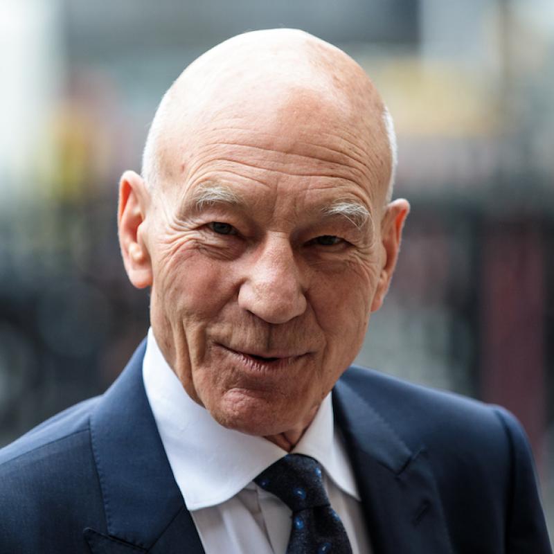 Actor Patrick Stewart gives the camera a grin in this photo from 2018